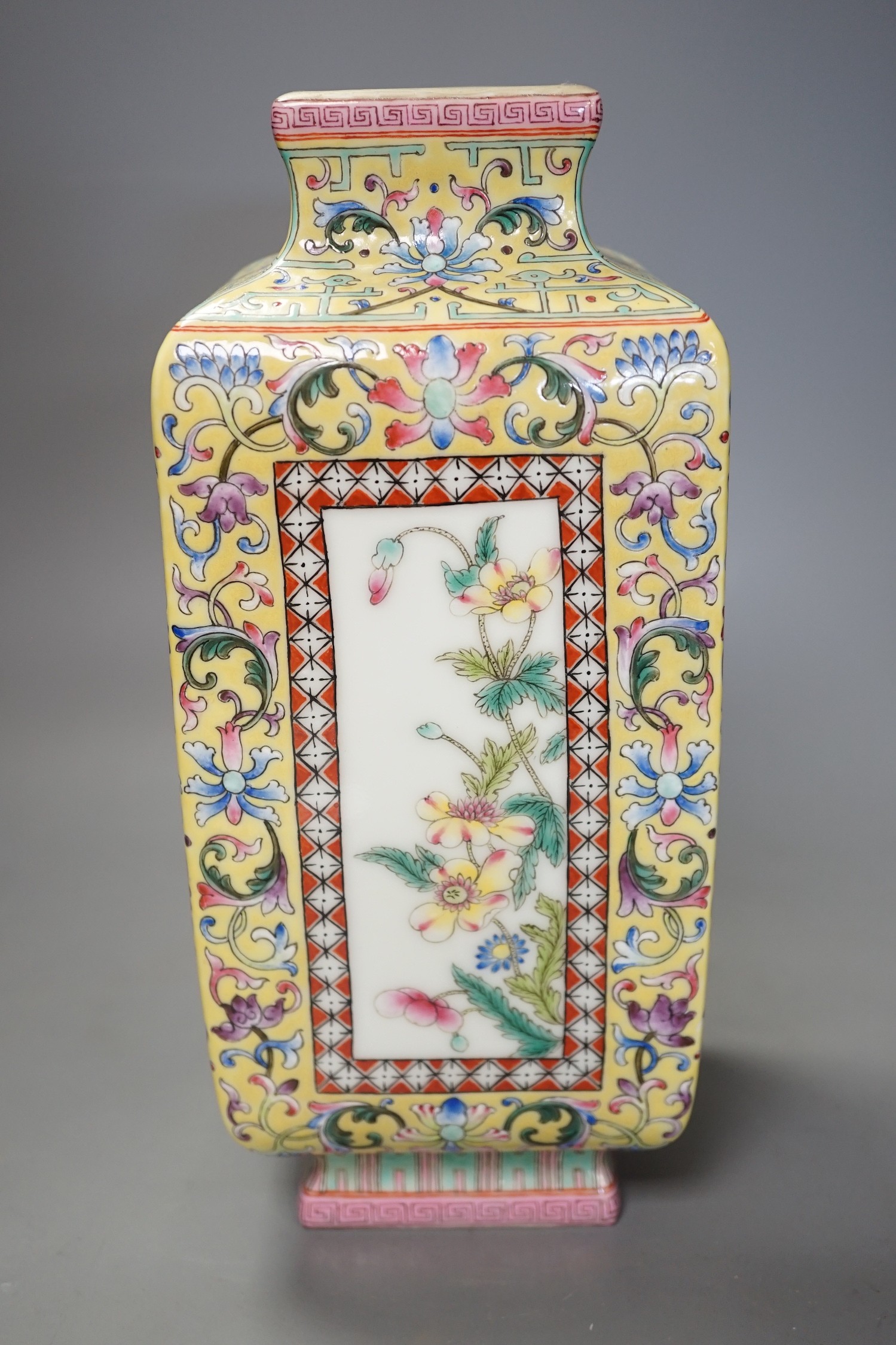 A Chinese yellow ground square floral vase, 27cm tall